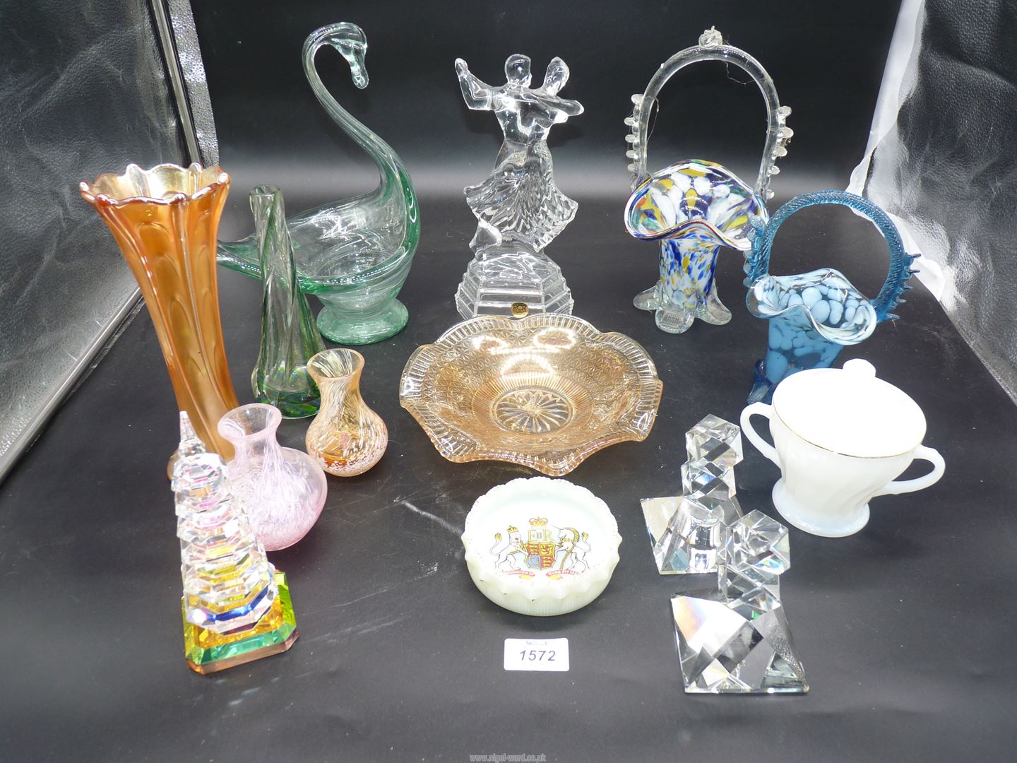 A box of miscellaneous glass to include; an end of day basket, small Caithness vase, swan bowl,