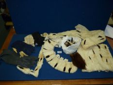 A quantity of Ermine tails and collars together with ladies gloves.