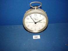 A vintage Kaiser Monarch Repeater alarm clock.