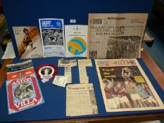An Aston Villa souvenir newspaper 'Won the world cup, March 1975', including rosette,