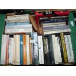 A box of novels including 'The Devil May Care' by Sebastian Faulks,