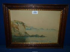 A wooden framed Watercolour depicting a coastal scene, no visible signature, 17" x 13".
