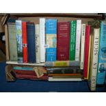 A box of books including 'Christ in Russia', 'L'Art en Sicile', 'Unraveling Piltdown',