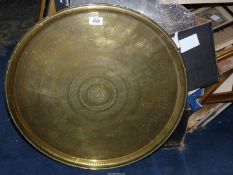 A brass Benares top, 22 3/4" diameter.