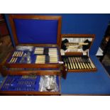 A comprehensive Oak cased canteen of Cutlery having two lower drawers,