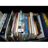 A crate of art related books including Renoir, Dictionary of Painters, David Hockney etc.