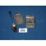 A silver commemorative spoon, a wire mesh purse and a white metal Chatelaine notepad.