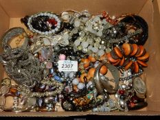 A large quantity of bangles, beaded bracelets, white metal bangle, Variety Club heart brooches etc.