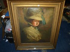 A heavy framed Oil on canvas portrait of a lady, label verso states 'Copy of a painting by Romney',