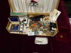 A box of costume jewellery including tie clips, cufflinks, necklace, earrings etc.