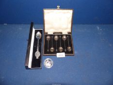 A cased set of six Birmingham silver coffee spoons dated 1930,