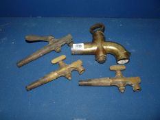 A large 19th Century brass tap made by 'C.
