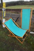 A pair of deck chairs.