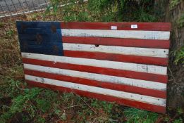 A U.S.A wooden flag, 4' x 2'.
