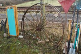 A pair of Howard Bedford cast iron implement wheels, 52" diameter.