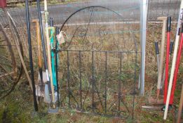 A wrought iron single gate, 32" wide x 42" high.