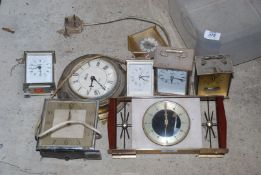 A selection of carriage clocks, plus other clocks.