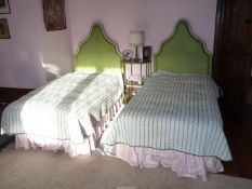 A pair of single headboards,