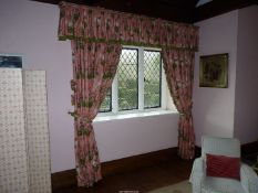Three pairs of interlined mercerized cotton curtains having mauve and white Geraniums on a pink