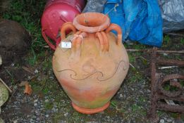 A terracotta urn.
