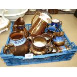 A quantity of copper lustre jugs, bowl, mugs and a swing lid water jug.