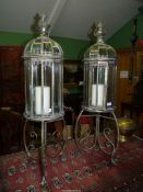 A pair of elegant twelve pane domed Brass framed floor standing Lanterns,