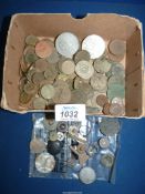 A quantity of two shilling pieces and three penny pieces,