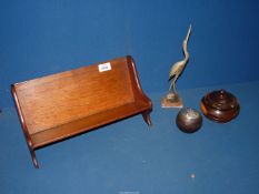 An early 20th century book trough, 14" long, a heavy treen jar and lid,