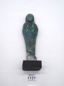 An ancient Egyptian blue faience ushabti, probably end of the New Kingdom or Late Period,