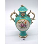 An early 19th century English porcelain two handled Vase and cover in the manner of Sevres,