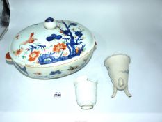 A Qianlong period porcelain tureen and cover, damaged and repaired,