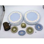 Six Wedgwood Cambridge blue plates having embossed cream ware rims of vines (10 1/2" diameter),