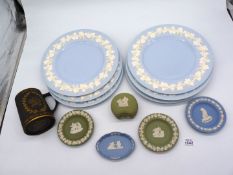 Six Wedgwood Cambridge blue plates having embossed cream ware rims of vines (10 1/2" diameter),