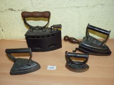 A group of four Irons including Coal Iron with wooden handle and finial,