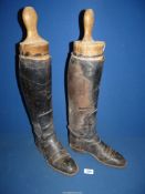 A pair of Gents Black knee high Riding boots, length of sole 10 1/2",