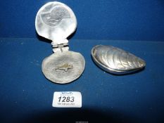 A Shell made from metal depicting the Cohasset 1992 First Offshore oil,