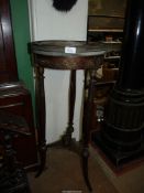 An elegant marble topped lamp Table having a pierced metal raised gallery, ormoul detailed frieze,