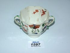 A rare Qianlong period two handled cup well painted in the vert imari palette with a fan pattern (2