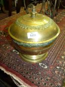 A large brass bowl and cover, zig zag pattern to lid, 11" tall.