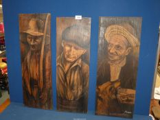 Three Catalan wooden painted portrait panels, 24 1/2" x 9 1/2".