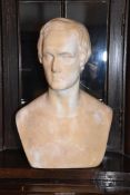 A large sculpted Stone Bust of a gentleman signed to the rear, L. Gardie sculp.