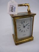 A brass cased, bevelled glass Carriage Clock, exa'd by Mappin & Webb, London,