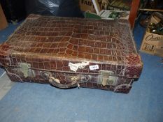 An incredibly heavy, high quality dark brown Crocodile Skin Suitcase,