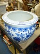 A large blue and white Chinese Jardiniere with floral decoration, 14 1/2" diameter x 12" tall.