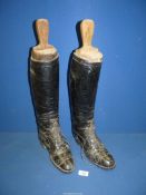 A pair of Ladies Black leather knee high Riding boots (ankle laced),