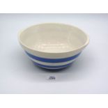 A T.G. Green 'Cornishware' mixing bowl with green shield mark, 10 1/2" diameter.