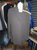 A Jaeger ladies trouser suit in brown and black herringbone pattern, size 16.