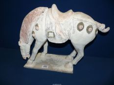 A large Tang Dynasty style clay figure of a Horse, 18" long x 14" tall (tail repaired).