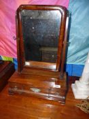 A diminutive Georgian Mahogany swing Mirror, the base with three trinket drawers,
