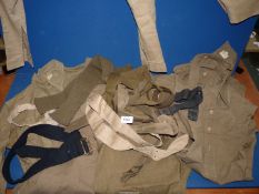 A quantity of Army shirts and jodhpurs by Hawks & Co. and belts and collars, etc.